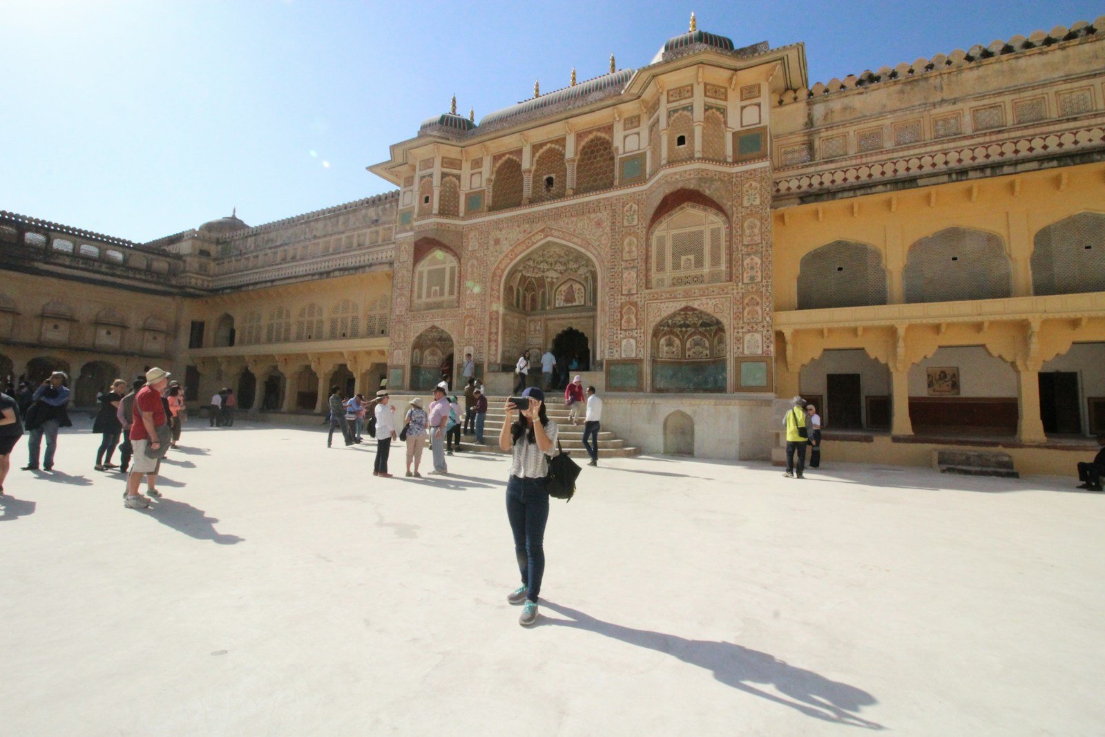 a group of people standing in front of a building